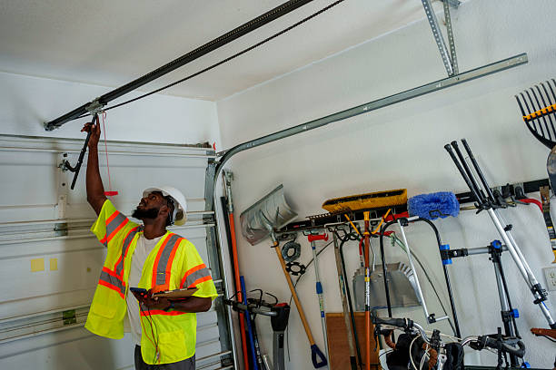 Professional Garage Door Panel Replacement technician working in Amboy, IL